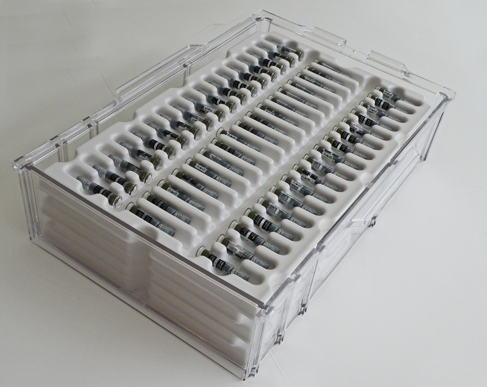 White horizontal syringe tray provided by Chemtech